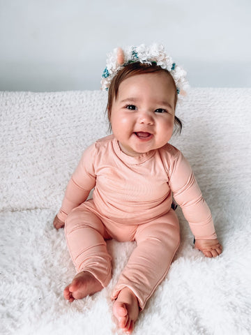 baby wearing a lemonade pink bamboo twinset