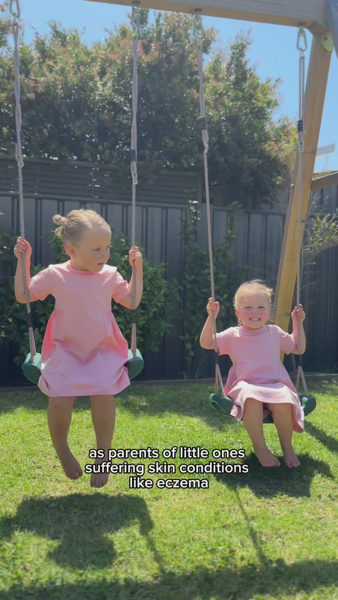 A mum giving a review of her two children wearing Baby Todd & Co. tee dresses